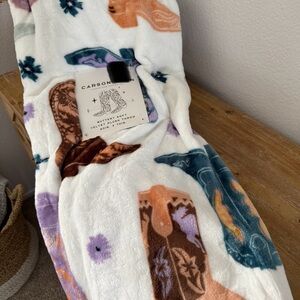 Carson & Co. Western Throw Blanket with Cowgirl Boots and Flowers.